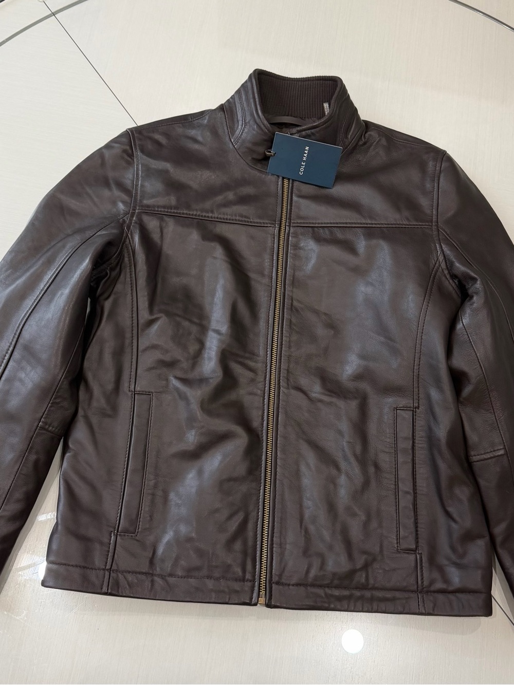 Cole Haan men’s genuine lambskin leather jacket in dark brown, size Small.